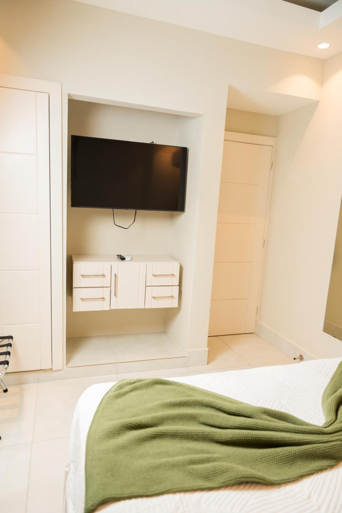 Hotel Stay Here Suites Santo Domingo Zimmer foto